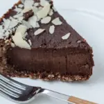 Chia and Carob Cake on the Plate with Fork