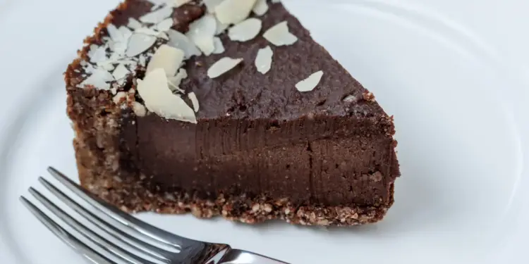 Chia and Carob Cake on the Plate with Fork