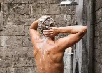 Man Taking a Shower Chemical-free Shampoo