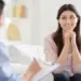 Smiling Woman Talking to Wellness Coach