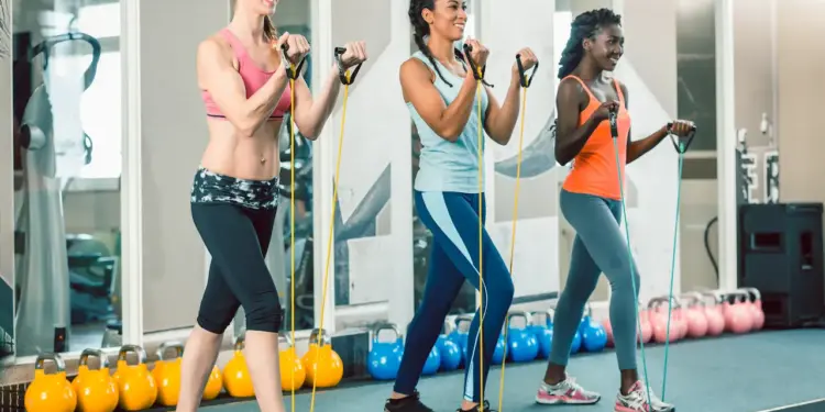 The Best Exercise Resistance Bands of 2024, Three Woman Exercising With Resistance Bands.